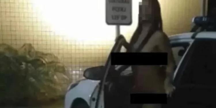 “Peladona” fotografada em delegacia é casada com inspetor de polícia no Rio de Janeiro